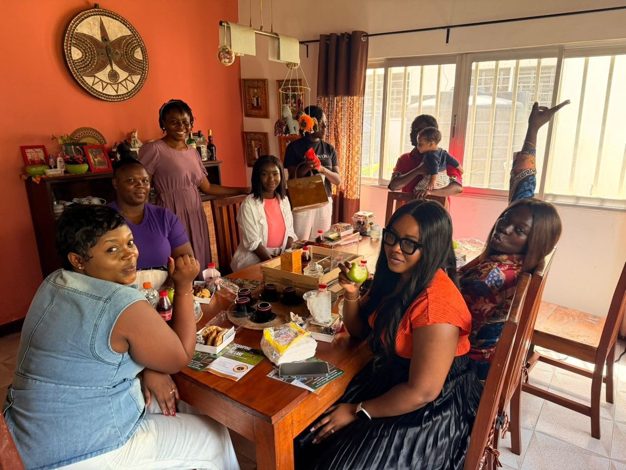 Smiling mums around a dining table at a Mum Thrive brunch