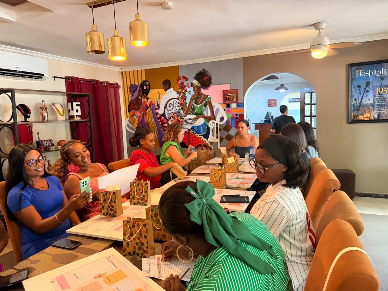 Mums laughing together at a self-care workshop